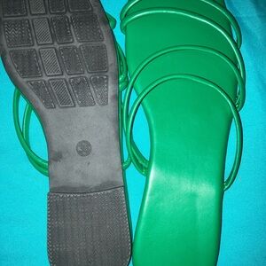 Size 9.5 green strappy flat slides sandals